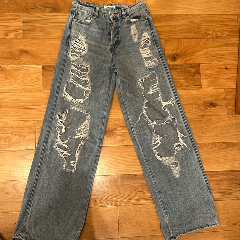 Light wash, high rise, ripped blue jeans from PacSun in a size 28.